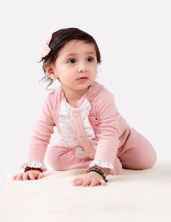 MIA TEXTURED ONESIE WITH RUFFLE DETAILING