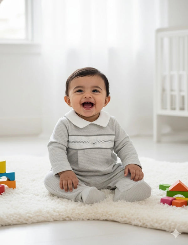 ZANE TEXTURED ONESIE WITH SMOCKED DETAILING